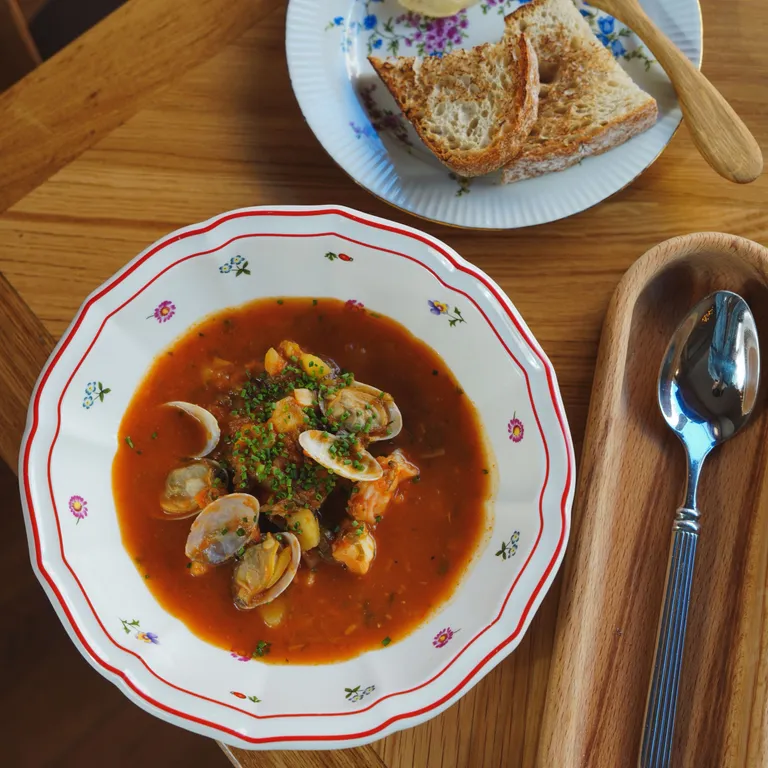 Fish Broth with vegetables and toast